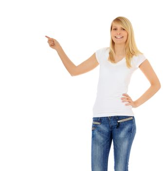 Attractive teenage girl pointing with finger. All on white background.