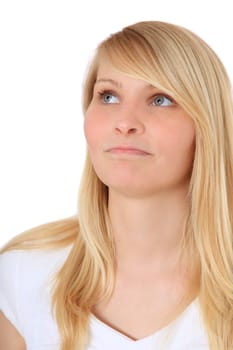 Attractive young woman looking upwards. All on white background.