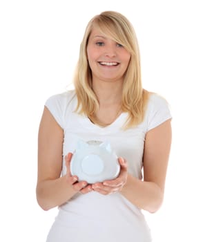 Attractive young woman holding piggy bank. All on white background.