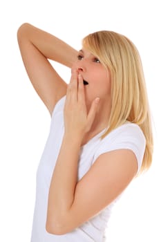 Attractive teenage girl yawning. All on white background.