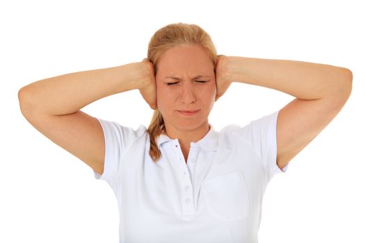 Attractive woman keeps her ears shut. All on white background.