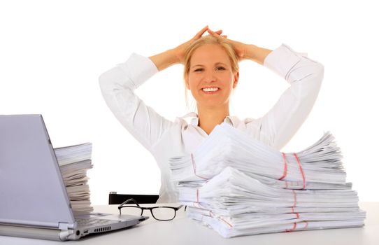 Smiling employee sitting at workplace . All on white background.