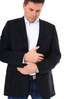 Attractive middle-aged man suffering from stomachache. All on white background.