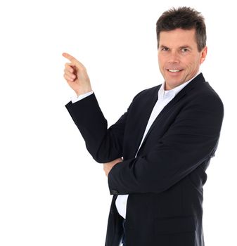 Attractive middle-aged man pointing to the side. All on white background.