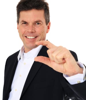 Attractive middle-aged man making a measuring gesture. All on white background.