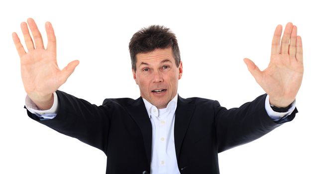 Attractive middle-aged man making repelling gesture. All on white background.