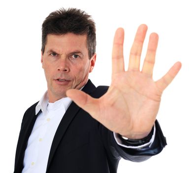 Attractive middle-aged man making repelling gesture. All on white background.