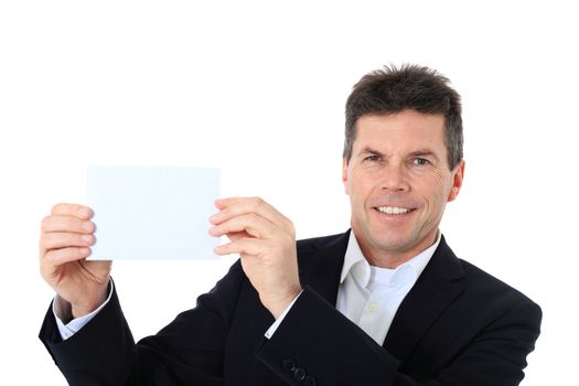 Attractive middle-aged man holding business card. All on white background.