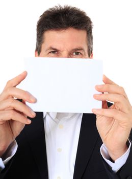 Attractive middle-aged man holding business card. All on white background.
