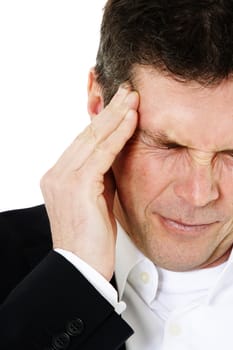 Attractive middle-aged man suffering from headache. All on white background.