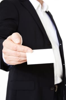 Attractive middle-aged man holding business card. All on white background.