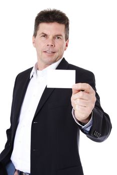 Attractive middle-aged man holding business card. All on white background.