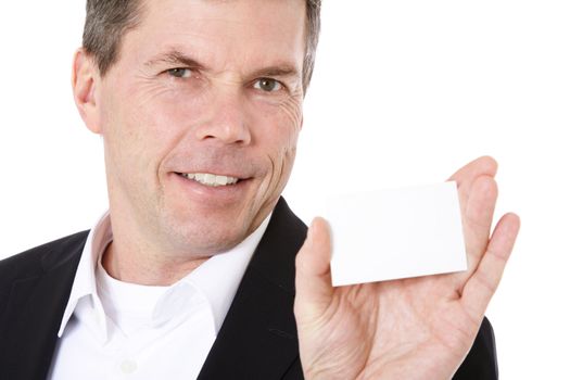 Attractive middle-aged man holding business card. All on white background.