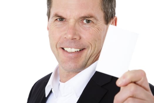 Attractive middle-aged man holding blank white card. All on white background.