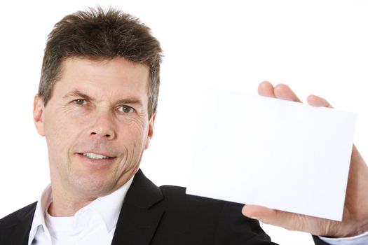 Attractive middle-aged man holding blank white card. All on white background.