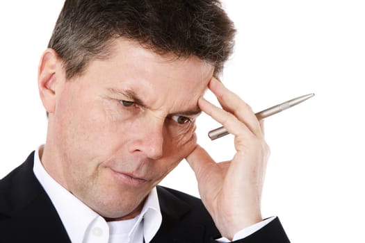 Attractive middle-aged man deliberates a decision. All on white background.