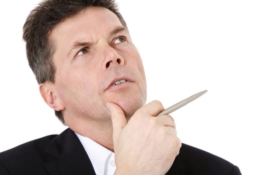 Attractive middle-aged man deliberates a decision. All on white background.