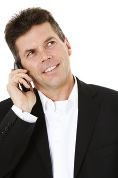 Attractive middle-aged man making a phone call. All on white background.