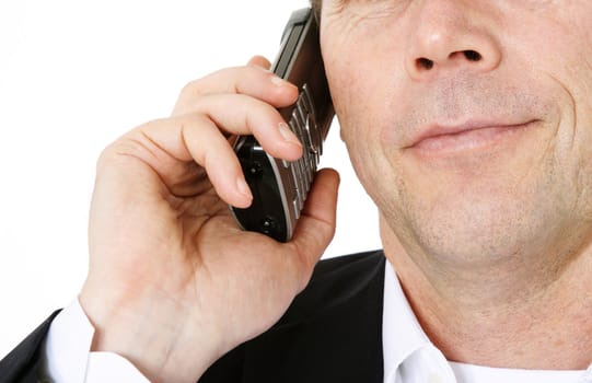 Attractive middle-aged man making a phone call. All on white background.