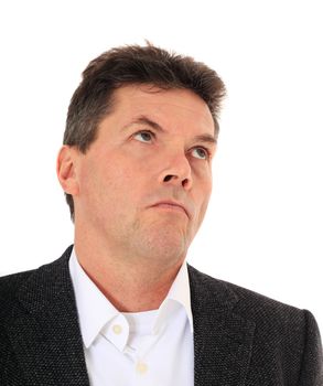 Attractive middle-aged man deliberates a decision. All on white background.