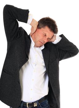 Attractive middle-aged man suffering from deafening noise. All on white background.