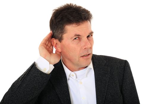 Attractive middle-aged man cannot hear anything. All on white background.