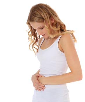 Attractive young woman suffers from stomachache. All on white background.