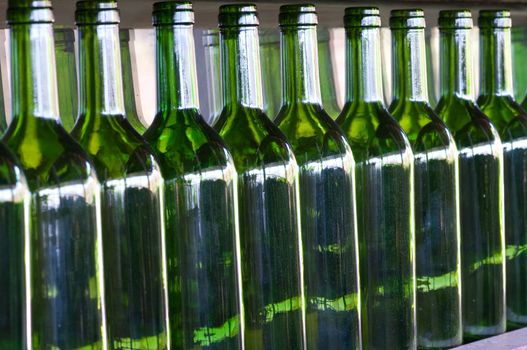 row of green bottles