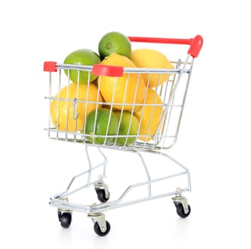 Lemons in a shopping cart. Isolated on white background.