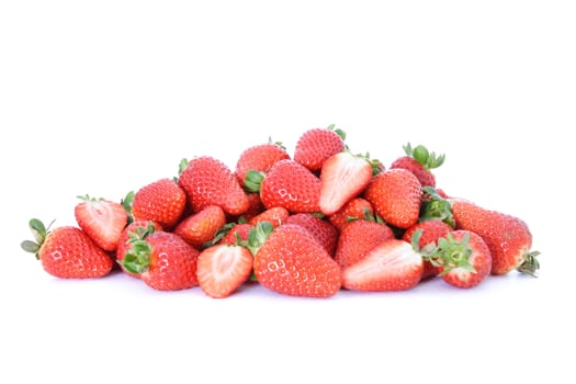 Ripe strawberries on white background.