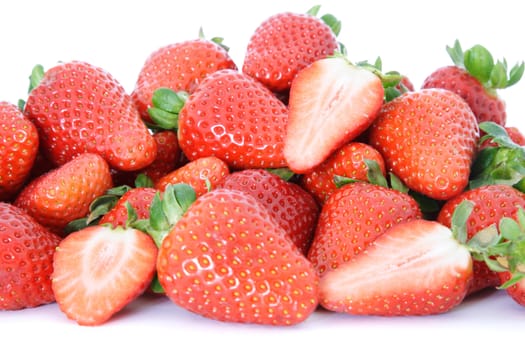 Ripe strawberries on white background.