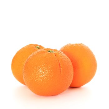 Ripe oranges on white background.