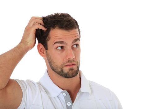 Clueless young guy. All on white background.