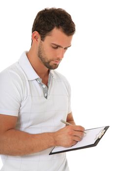 Portrait of a young man writing on clipboard. All on white background.