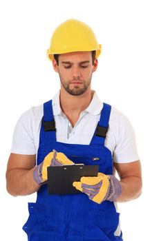 Construction worker writing on clipboard. All on white background.