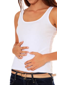 Attractive young woman suffers from stomachache. All on white background.