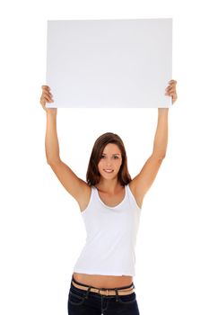 Attractive young woman holding blank white sign. All on white background.