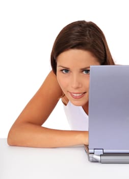 Attractive young woman surfing the internet. All on white background.