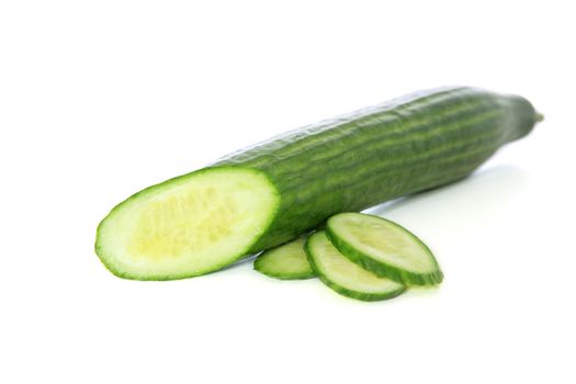 Fresh sliced cucumber. All on white background.