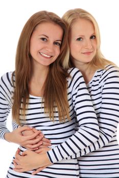 Portrait of two young women. All on white background.