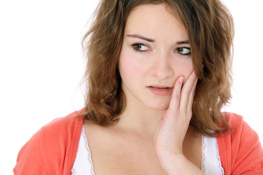 Attractive young woman suffering from toothaches. All on white background.