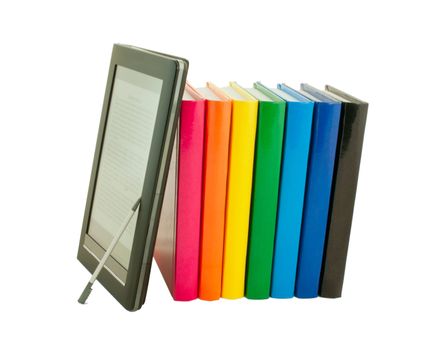 Stack of colorful books and electronic book reader on the white background