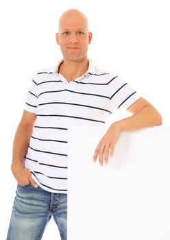 Attractive middle age man leaning to blank white sign. All on white background.
