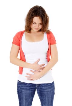 Attractive young woman suffering from pain in the abdomen. All on white background.