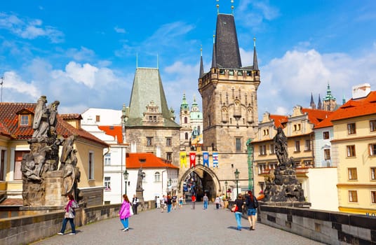 Tourists on Charles Bridge, June 11, 2012, Prague,Czech Republic. Annually Prague is visited by more than 3,5 million tourists.