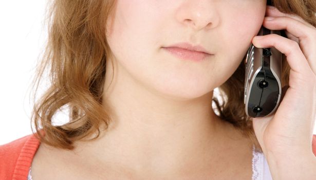 Attractive young woman making a phone call. All on white background.