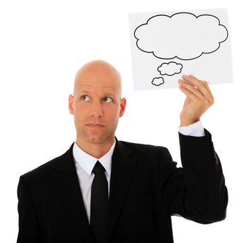 Attractive businessman holding speech bubble next to his head. All on white background.
