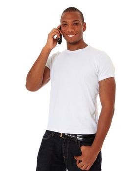 Attractive black man talking on the phone. All on white background.