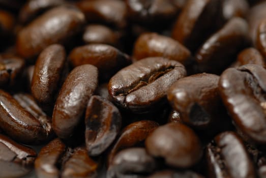 Macro image of caffinated arabica coffee beans.