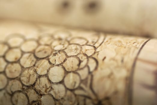 Simple studio shot of three wine corks. Focus on 1st cork, shallow DOF.